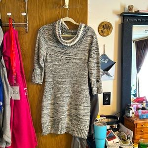 Long cowl neck sweater.  Black and white.